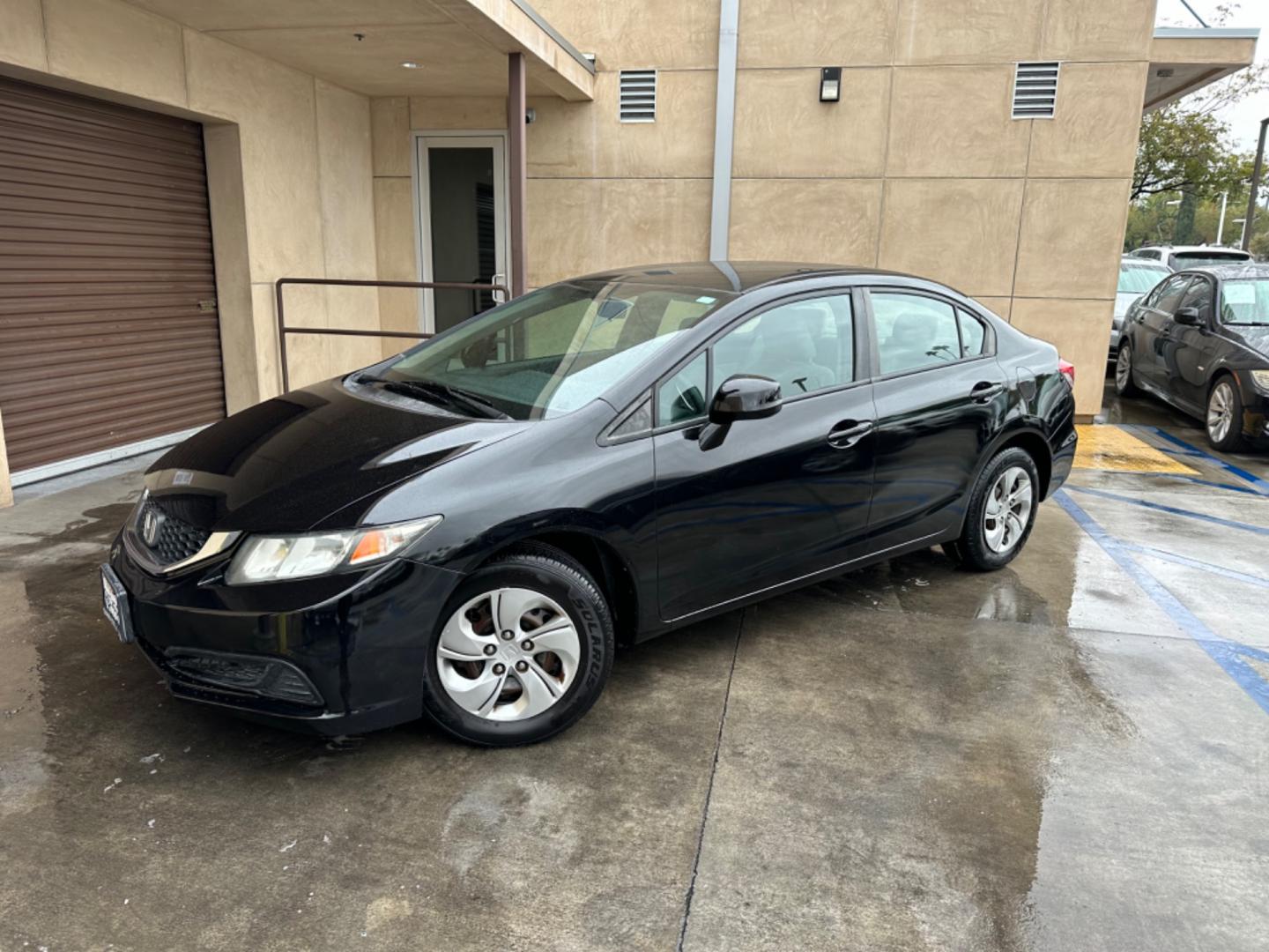 2013 Black /Grey Honda Civic LX Sedan 5-Speed AT (19XFB2F53DE) with an 1.8L L4 SOHC 16V engine, 5-Speed Automatic transmission, located at 30 S. Berkeley Avenue, Pasadena, CA, 91107, (626) 248-7567, 34.145447, -118.109398 - New Paint! Gas Saver! Discover Reliable and Efficient Driving: 2013 Honda Civic LX Now at Our Pasadena, CA Dealership Step into the world of efficiency and reliability with the 2013 Honda Civic LX, a standout choice now featured at our BHPH dealership in Pasadena, CA. Known for its dependable per - Photo#0